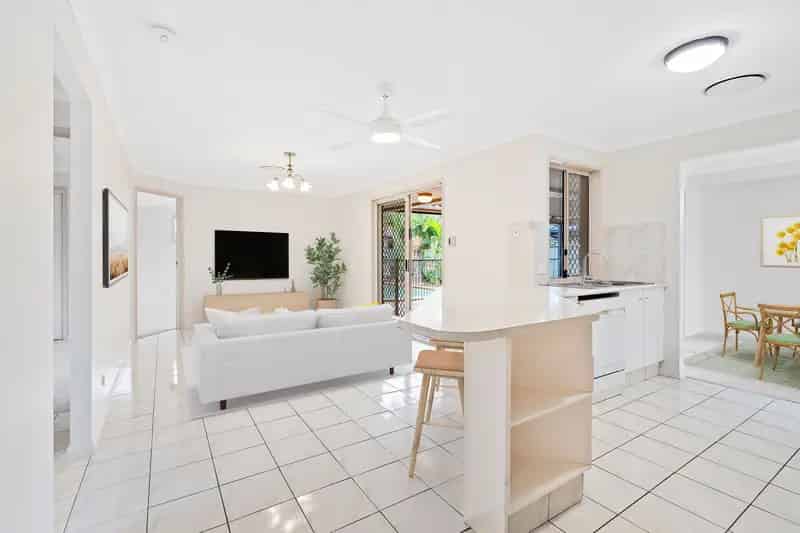 Versatile family home for sale in Burleigh Waters with pool and spacious layout