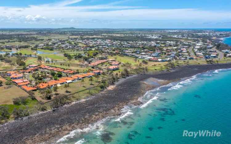 Buy property seaside in Coral Cove with golf course views