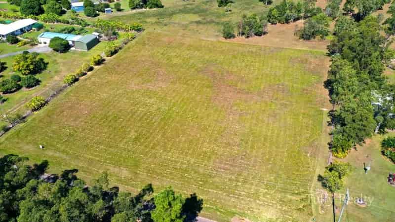 For Sale Large Level Acreage Block in Cardwell with Mountain Views