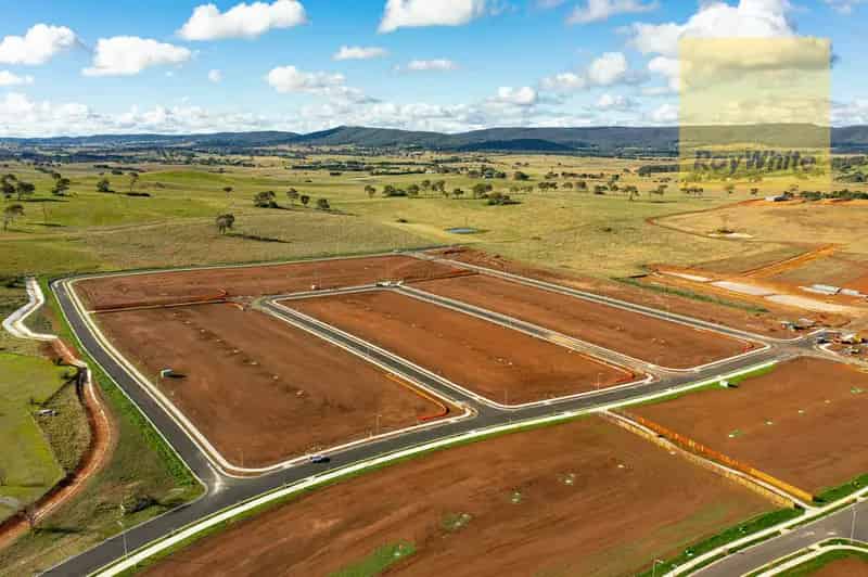 Buy registered land near town centre with flat terrain and amenities