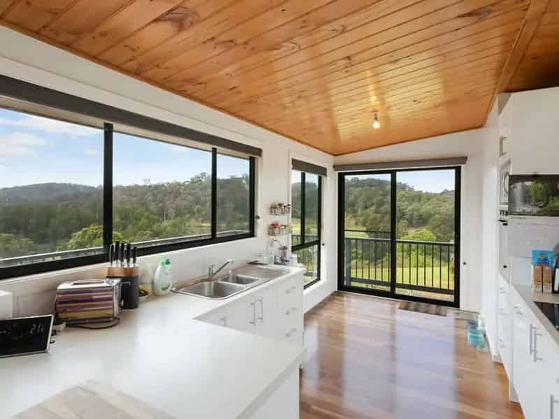Buy coastal property at Bega River with three-bedroom home and views