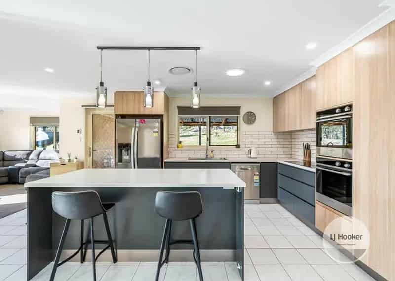 Buy modern home with chalet and stunning views near Hobart
