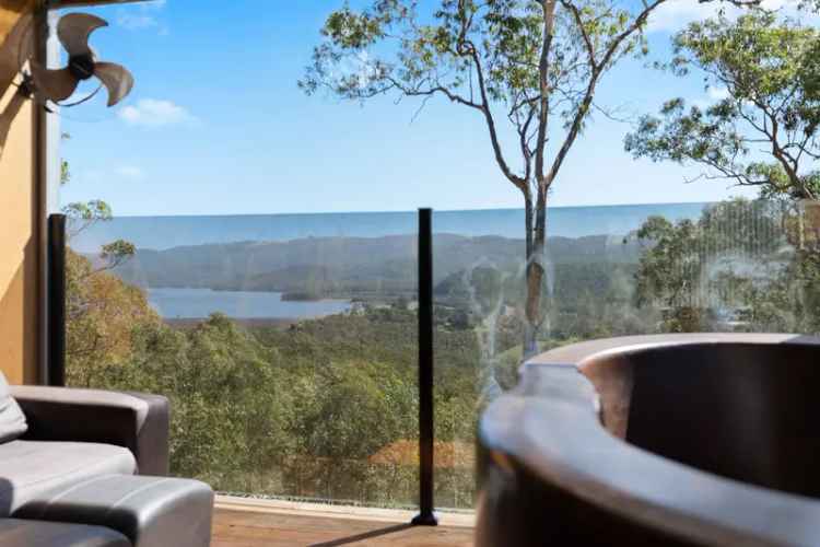 Buy Mountainside Retreat in Tallai with Eco Cabin and Panoramic Views