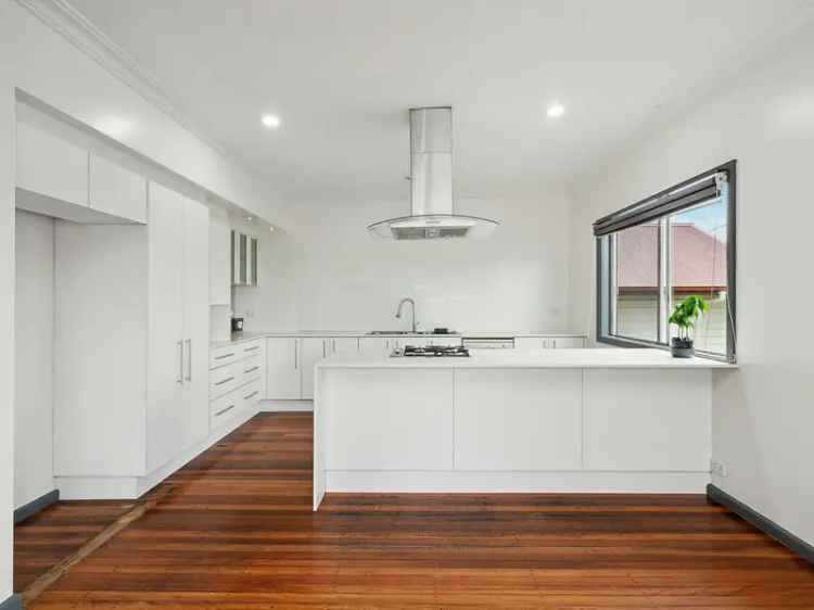 Buy versatile home on level block at CBD fringe with unique features